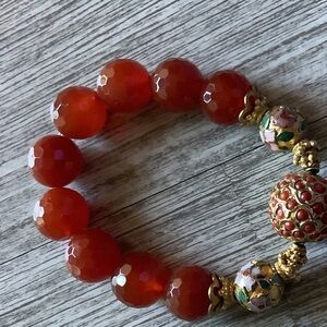 Natural dark orange beads with large orange bead